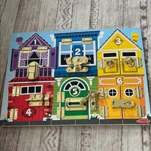Melissa & Doug Colorful Latches Activity Board
